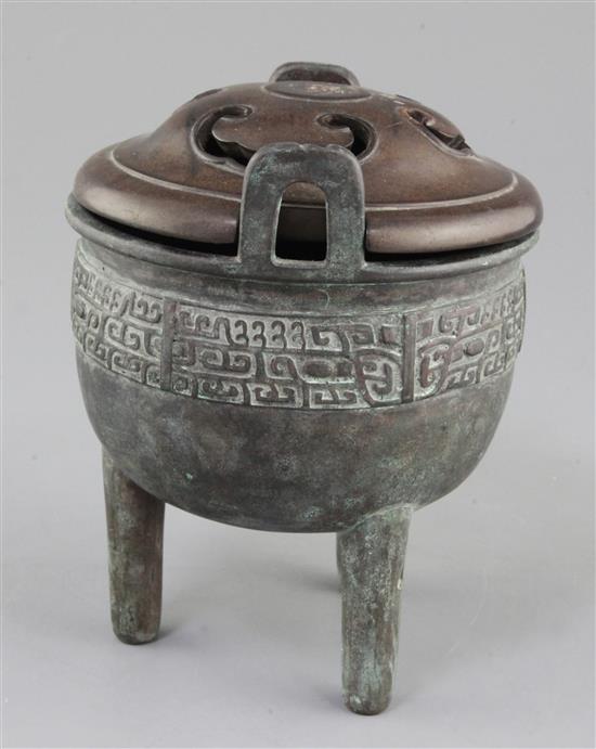 A Chinese archaic bronze tripod ritual food vessel, Ding, Qing dynasty., 17cm high, 14cm wide